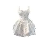 Falda de Flores Blanca y Verde Frances Primavera y Verano Nuevo Estilo Dulce Ins Súper Hada Deseo Puro Sexy Falda con Tirantes Vestido