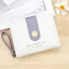 Billetera corta para mujer de nuevo estilo, billetera simple estilo japonés, billetera plegable para estudiante, monedero lindo de nicho con múltiples ranuras para tarjetas