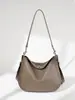 Bolso cruzado de diseño de nicho de lujo versátil retro europeo y americano, bolso de hombro debajo del brazo de cuero genuino de gran capacidad