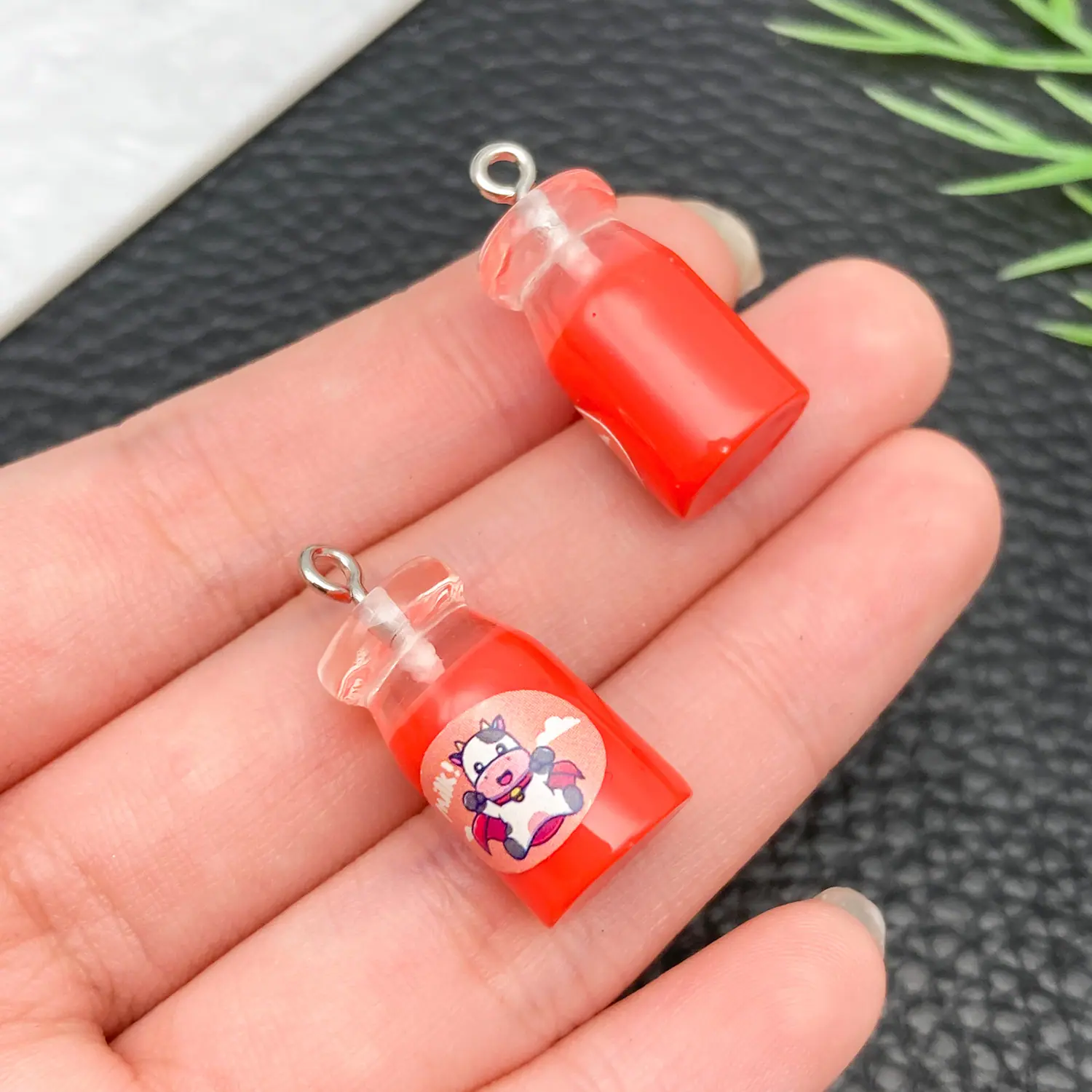 24099-JD3-透明粉色牛奶奶瓶24x11x11mm-1