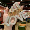 Llavero de Moda Popular Transfronterizo Full Diamante Colgante de Alta Gama Tendencia Elegante con Estilo Accesorio para Bolso de Mujer Venta al por Mayor