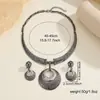 Set de collar y pendientes vintage de aleación europeo y americano para mujer, chapado en oro, chapado en gunmetal, incrustado de diamantes, moderno y exagerado conjunto de joyería de dos piezas