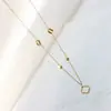 Collar Recortado de Trébol de Cuatro Hojas para Mujer Chapado en Oro de 18 Quilates Diseño de Clip de Cuentas Cadena de Clavícula Elegante de Gama Alta Popular No se Desvanece