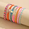 Pulseras Bohemias Creativas Antiguas Europeas y Americanas Transfronterizas Pulseras de Ola Personalizadas Tejidas con Conchas y Cuentas de Arroz Pulseras de Amor