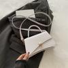 Bolso de mujer nuevo de otoño e invierno 2025, estilo vintage, con cierre bajo el brazo, sencillo, portátil, bandolera de hombro, moderno, pequeño, cuadrado.