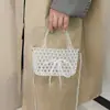 Bolsa de Mão Nova 2025 Feita à Mão com Contas para Mulheres Transparente Metálica Design de Nicho Bolsa Transversal Estilo Ins Bolsa de Festa