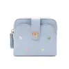 Cartera de monedas y tarjetero bordados nuevos para comercio exterior transfronterizo, con un lindo diseño de dibujos animados, múltiples compartimentos y un cierre magnético para facilitar su transporte.