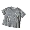 Camiseta de manga corta para niñas, nuevo estilo de verano 2026, camiseta con estampado de dibujos animados para niñas, absorbente de sudor, transpirable, agradable para la piel, moderna