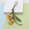 En Stock de Fábrica Moda Popular Más Vendido Estilo Nuevo Europeo y Americano Osmanthus Dorado Llavero Pu Lindo Colgante para Bolso Accesorio de Alta Gama