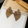 Pendientes colgantes de rombos con borlas tachonados de diamantes de aguja de plata transfronterizos europeos y americanos, pendientes exquisitos y de moda, pendientes versátiles y elegantes al por mayor