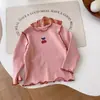 Camiseta Básica con Estampado de Cerezas para Niña 2026 Otoño Nueva Moda Estilo Coreano Camiseta para Bebé Niña con Bordes de Volantes para Otoño e Invierno