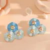 Pendientes de Venta Caliente Transfronterizos Europeos y Americanos, Lujo Ligero, Pendientes de Diseño de Nicho de Alta Gama, Flor Dorada Simple Elegante para Mujer