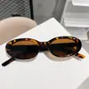 Gafas de sol ovaladas para niños de Corea del Sur alta gama moda forma cóncava simple gafas de sol para niños y niñas