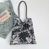 Bolsa de Ombro em Lona 2026 Novo Estilo Coreano Moda Estampada Artística Bolsa de Ombro Grande Capacidade Bolsa para Alunos Aula Reforço