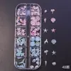 Popular Conjunto de Caixa Transfronteiriço com 12 Compartimentos de Decorações para Unhas, Pequenos Acessórios de Resina, Brincos DIY, Presilhas de Cabelo, Decorações de Unhas com Conchas