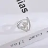 Anillo Abierto con Forma de Corazón Hueco Bañado en Oro Real Anillo de Zirconia Dorada Moda Coreana Tendencia al por Mayor Anillo para Dedo Comida Roja de Internet para Mujer