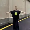 Camiseta negra de manga corta con estampado de manzana verde de seda de leche, unisex, corte holgado, nuevo top de verano de nicho estilo americano