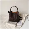 Bolso de hombro para el día a día, gran capacidad, estilo relajado, alto valor estético, chic casual, bolso tipo cubo de tendencia niche