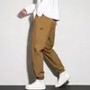 Pantalones de trabajo para hombre, adecuados para primavera y otoño, con estilo callejero americano, diseño retro, marca de moda, pernera cónica, casual, deportivo y funcional, y también se pueden usar como pantalones para exteriores