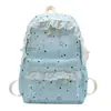 Mochila casual transfronteiriça com bolso frontal, acabamento em renda, cordão lateral, grande capacidade, mochila com estampa de estrelas