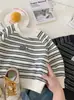 Sudadera Rayada para Niños Primavera y Otoño 2026 Nuevo Estilo Coreano Elegante Camiseta Básica de Manga Larga para Niños Top de Moda