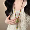 Colar de corda trançada estilo chinês zen para mulheres, corrente de suéter com pingente de folha retrô de madeira estilo étnico boêmio