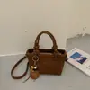 Otoño 2026 Nuevo Estilo Coreano Bolso de Mano Sencillo Bolso Cubo Sencillo de Moda Bolso de Hombro Único con Textura Bolso Cruzado
