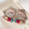 Guantes de dedo medio para niños otoño e invierno niños medio dedo cálidos lindos estudiantes de primaria escritura guantes de punto de doble propósito al por mayor