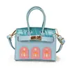 Mini bolso infantil transfronterizo, estilo coreano, lindo, moderno, de alta gama, nicho y bolso ligero de lujo estilo Kelly para niñas