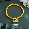 Pulseira feminina antiga de cobre em formato de cabaça, cor areia dourada, com contas douradas, design de corda elástica, joias de latão banhado a ouro, fabricantes, atacado