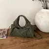 Bolsa de mão de design nicho estilo coreano, nova para o outono de 2026, transfronteiriça, bolsa de ombro e transversal de alta qualidade para o dia a dia, bolsa de bolinho