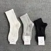 Meias de massagem masculinas meias de cano médio estilo casal anti-odor unissex todas as estações esportivas cor sólida casuais meias curtas da moda