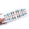 24 Piezas de Nuevo Arte de Uñas Temático de la Copa del Mundo Transfronterizo Forma de Almendra Chapado en Oro Ojo de Gato Fútbol Uñas Portátiles Exquisitas Piezas de Uñas Portátiles
