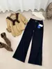 Otoño TOP estilo europeo Guangzhou Trece Filas retro color profundo de bloqueo denso suave y cómodo jeans de pierna ancha 61862