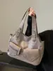 Bolsa de ombro retrô transfronteiriça europeia e americana de grande capacidade, novo modelo 2026, bolsa tote fashion color-blocking, bolsa feminina de alta qualidade