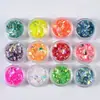 Lentejuelas para decoración de uñas polvo brillante 12 colores papel de concha polvo de perla diamante láser corazón de melocotón decoración de uñas material para slime DIY