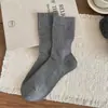 Meias de outono e inverno estilo preguiçoso com trama vazada, de comprimento médio para mulheres, cor sólida, versáteis, estilo japonês, combinadas com sapatos de couro pequenos, meias de algodão de cano longo