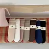 Meias de cano médio com babados estilo coreano IOULOR para mulheres, meias de algodão caneladas verticais, cor sólida suave, adequadas para combinar com sapatos de couro pequenos