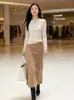 5% seda de morera, 5% cachemira, 90% lana de oveja, Fábrica de Tejidos Puyuan, falda larga de punto versátil estilo coreano con diseño cepillado de lana