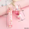 Llavero de Conejo Grande de Acrílico con Bolas de Burbujas Rellenas de Aceite y Arena Líquida Kiki Colgante para Bolso Figura de Coche de Dibujos Animados Regalo