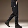 Pantalones casuales gruesos de chenilla suaves y pegajosos para hombre, nuevo estilo de otoño, pana, pantalones de chándal holgados para hombre