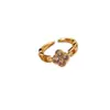 Nuevo Anillo de Cuatro Hojas de Zirconia de Lujo Ligero de Moda Ins Anillo Abierto de Trébol de la Suerte para Mujeres Venta al por Mayor Coreana y Japonesa