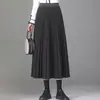Saia Plissada de Lã da Moda Meia Saia Feminina 2026 Outono Inverno Nova Cintura Alta Cobrindo o Quadril Saia Longa Elegante para o Dia a Dia Saia de Barra Larga