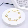 Pulsera de Acero de Titanio Trébol de la Suerte Flor de Cinco Hojas, Sencilla y Moderna, Versátil, Estilo de Lujo Ligero, Juego de Joyería de Nácar de Doble Cara