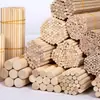 Palitos redondos de madera transfronterizos, palitos redondos de nogal para manualidades DIY, tiras finas de madera perforadas, palitos de helado, palitos de madera creativos para manualidades infantiles
