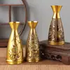 Venta al por mayor del fabricante Jarra de vino de latón Dispensador de vino Ciruela Orquídea Bambú Crisantemo Copa de vino Adornos de cobre creativos Dispositivo de almacenamiento de vino Baifu de cobre