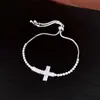 Pulsera de cordón con colgante de cruz de circonita, sensación de lujo ligero de alta gama, diseño de nicho a la moda, accesorio de mano único