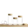 Botella de vidrio de borosilicato alto con un diámetro de 47 mm, tapa con veta de madera, botella de vidrio sellada, botella de empaque visualizable para pastillas y polvo, venta al por mayor