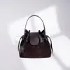 Bolsa Transversal Color Block de Nicho Outono/Inverno 2026, Bolsa de Mão Patchwork em Couro Genuíno, Versátil com Pingente de Pônei, Bolsa Saco de Ombro Único