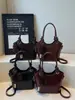 Bolso de mano de lujo accesible de moda para mujer 2025, bolso cruzado casual tipo cubo para hombro, bolso de alta gama